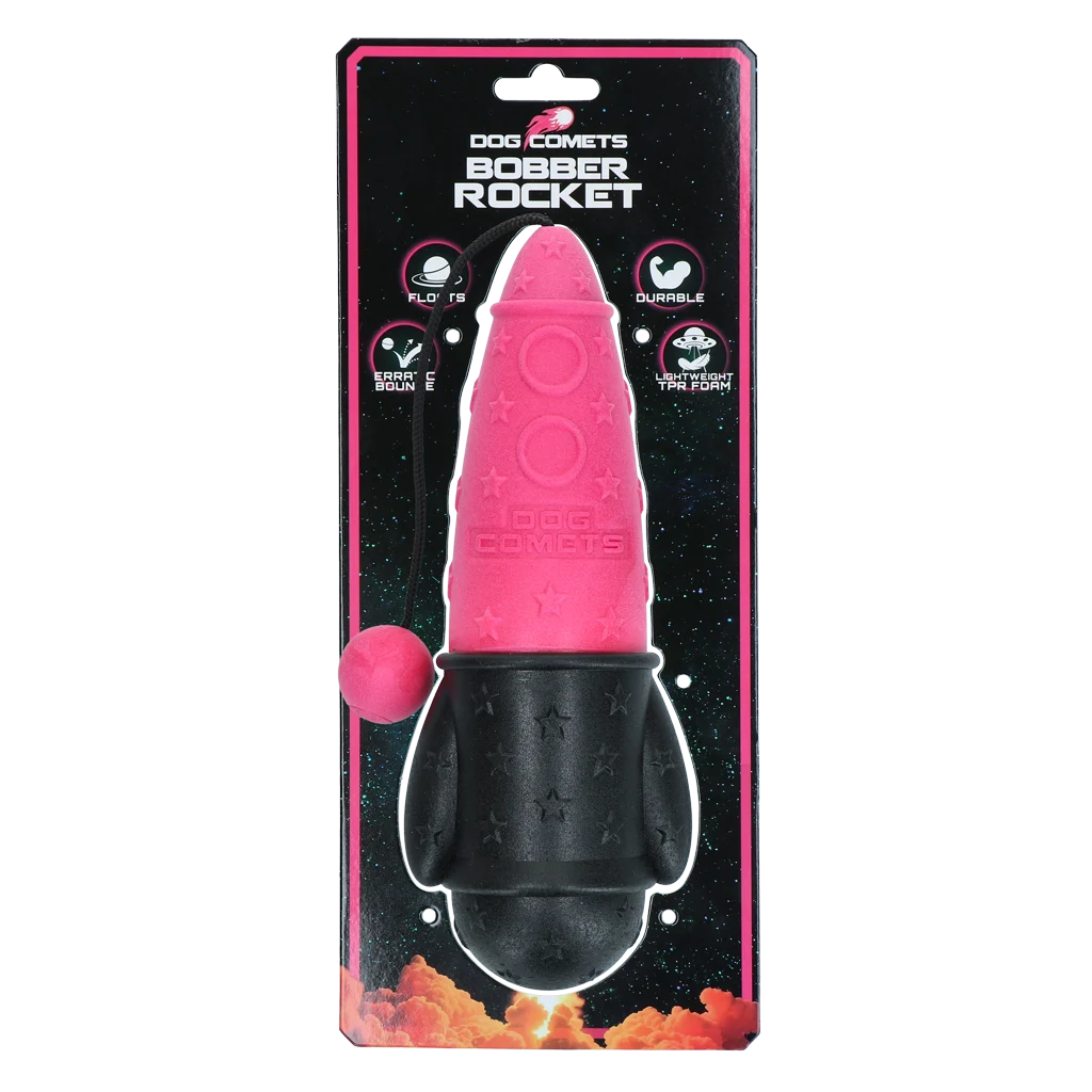 COME077P.png Aportovací hračka se šňůrou, plovoucí, Ø 65 x 235 mm, růžová – Dog Comets Bobber Rocket - Obrázek 1